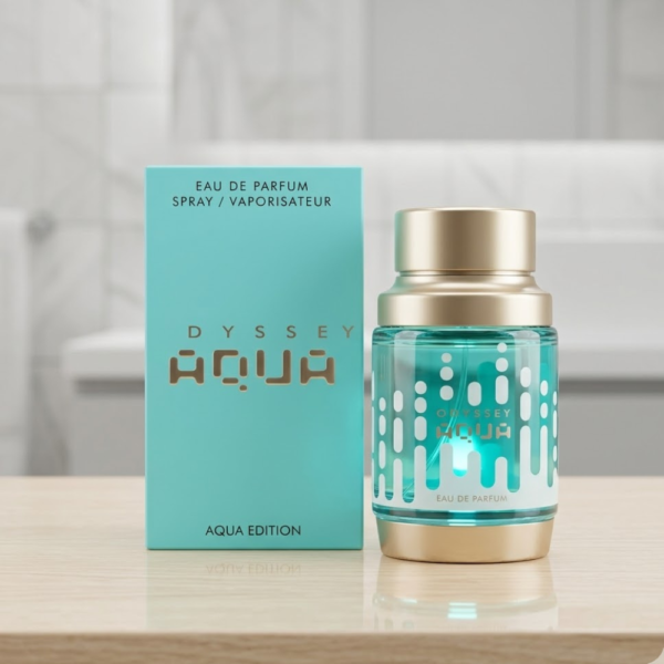 Frasco de perfume Odyssey Aqua de Armaf con diseño circular azul en degradé y detalles plateados.